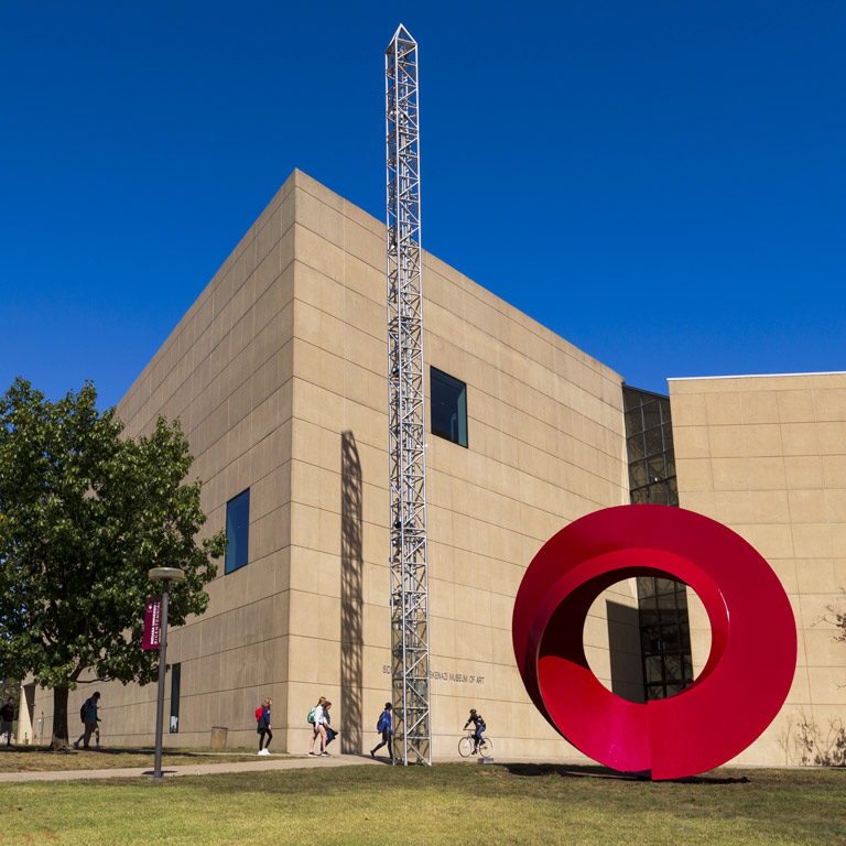 The front of the art museum, with the red circular sculpture Indiana Arc in the foreground.