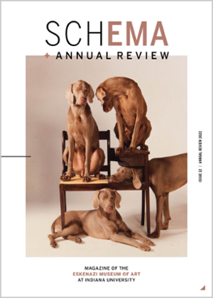 A photograph of several bloodhounds sitting on or around a wooden chair is featured on the front cover of SCHEMA magazine. The cover also notes that this is Issue 12, Spring 2023, and contains the museum's annual review.
