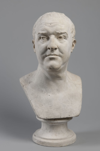 Portrait bust of a man with very short or no hair, a lined forehead, and slightly furrowed brow.