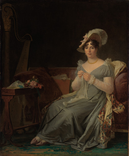 A woman with light skin, dark curly hair, and a serious expression is seated on a red couch holding a piece of white cloth. She is wearing a pale blue dress with white sleeves and a large hat decorated with a bow and a feather.